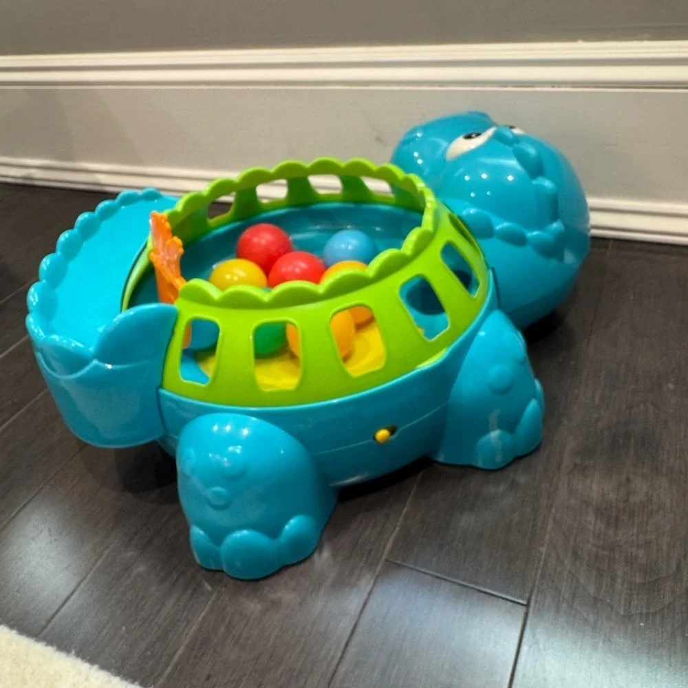 Fisher-Price Go Baby Go! Poppity Pop Musical Colorful Dinosaur Ball Toy Toddler